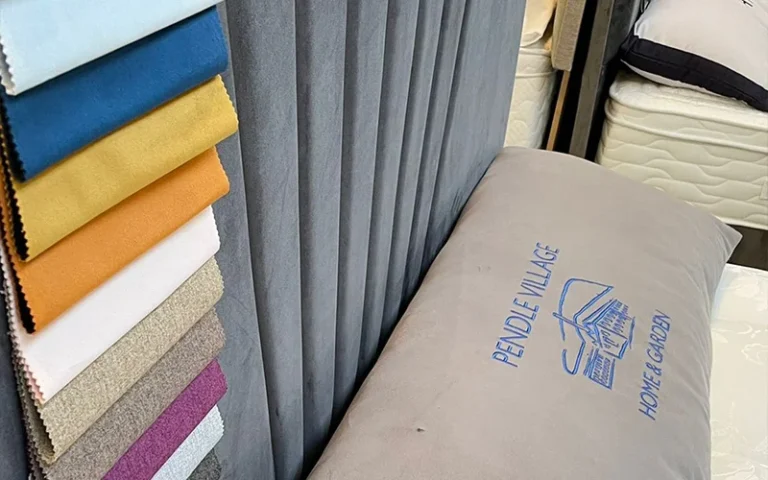 The image shows a Bed Headboard. You can choose from lots of colour fabrics, designs and sizes. Create your perfect bed headboard at Pendle Village Bed Shop, Near Burnley Lancashire
