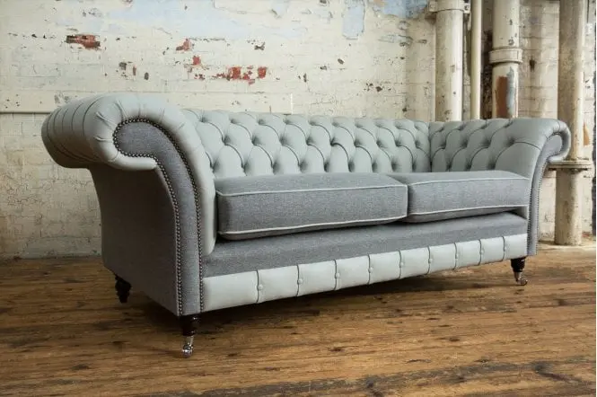 Side Angle With Three Legs View of Chatsworth Chesterfield Sofa - Styled in a Room