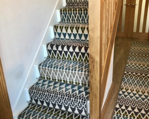 Alternative flooring - Margo Selby in design fairisle with Homepride stair rods in satin nickel finish 1